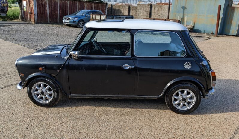 
								Mini Cooper 1270 by John Cooper 1990 genuine 41,400 miles. Original black. Alloy wheels SKU394 full									